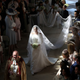 Meghan Markle walks down the aisle as she arrives in St George's Chapel at Windsor Castle for her wedding to Prince Harry in Windsor, Britain, May 19, 2018. Danny Lawson/Pool via REUTERS - RC1CC4F0AE50